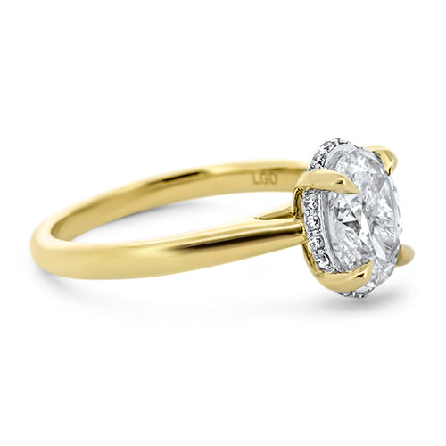 Oval, low profile, diamond engagement ring