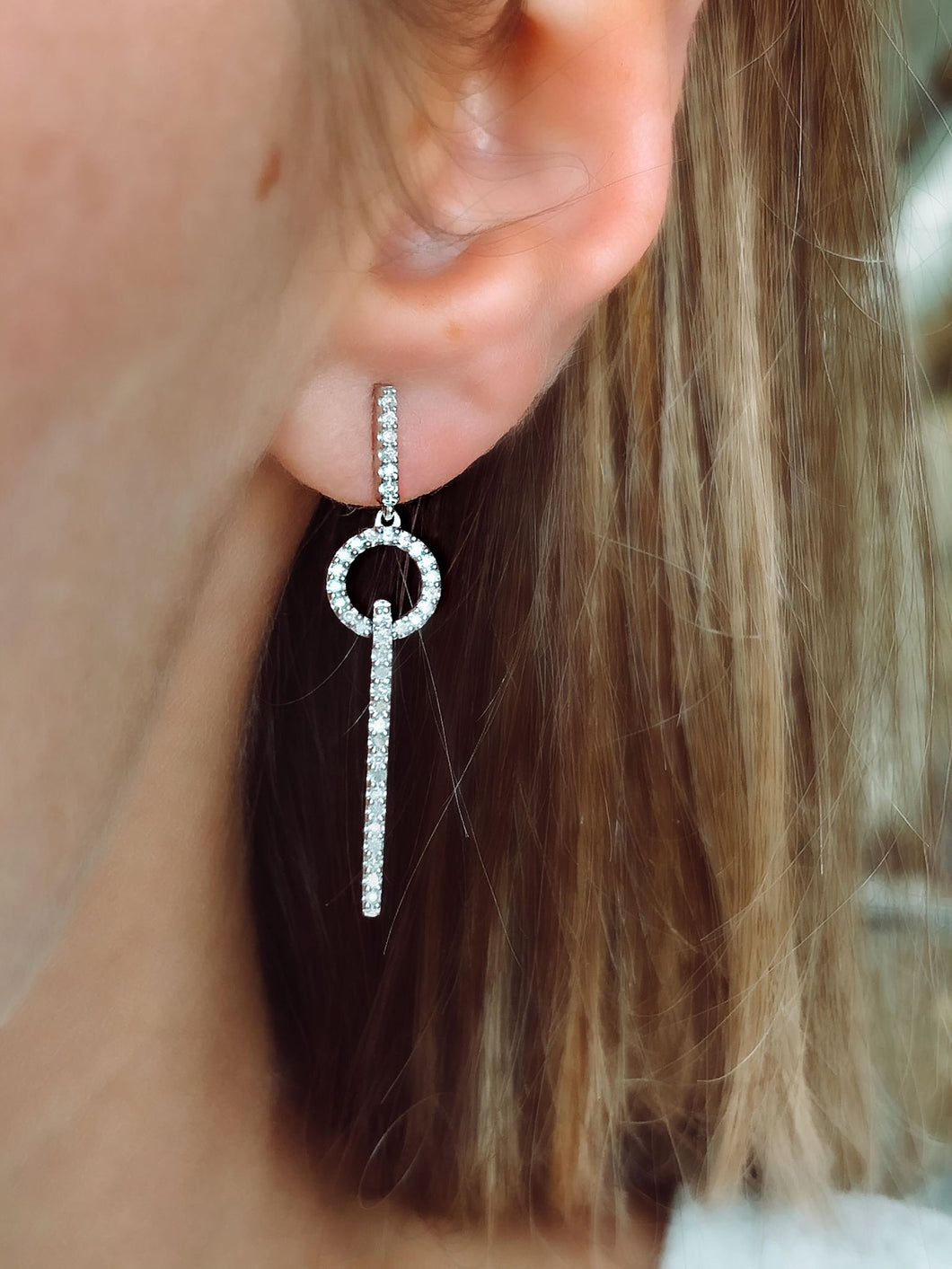 Trendy White Gold Diamond Dangle Earrings